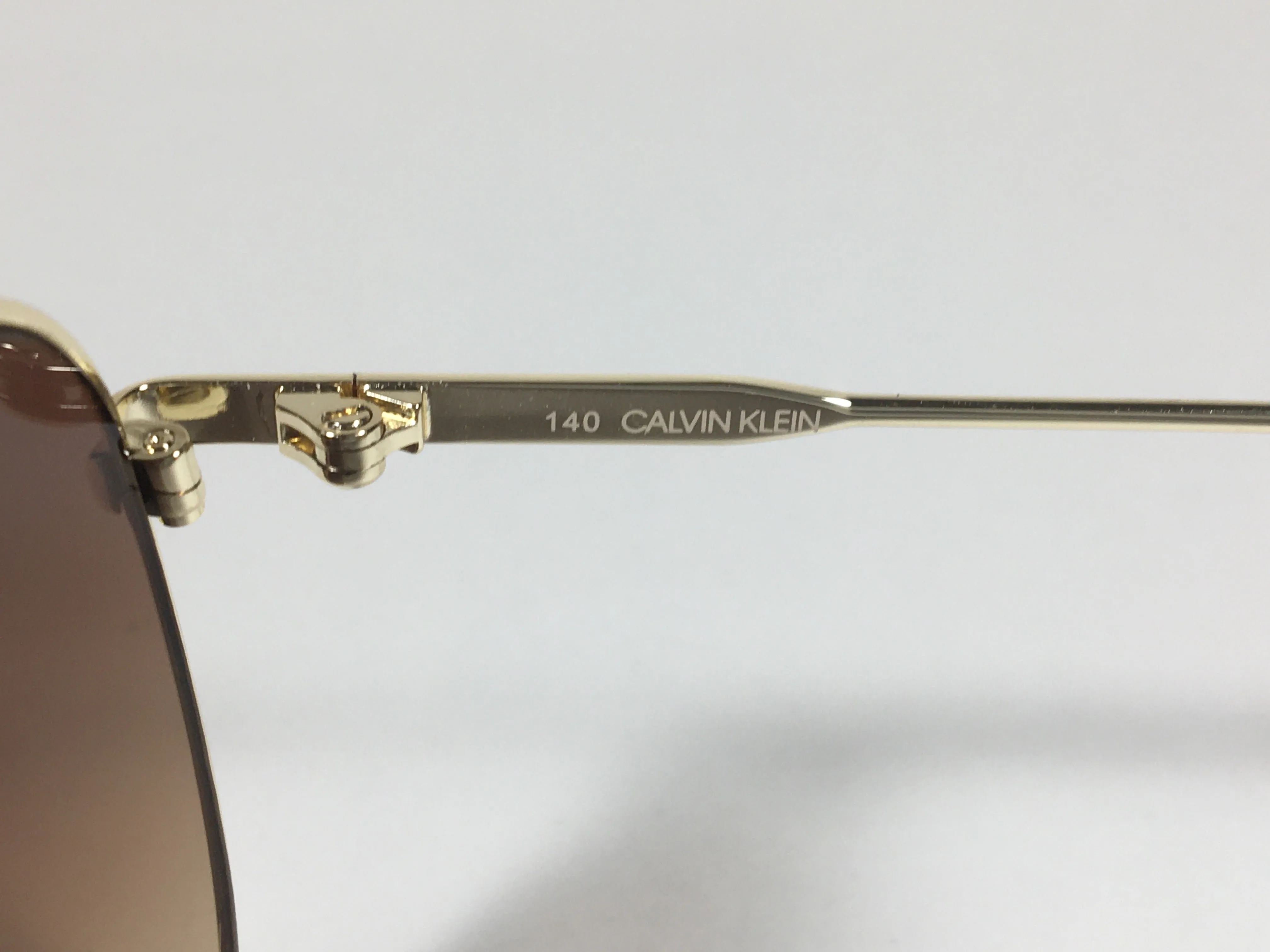 Calvin Klein Aviator Pilot Sunglasses CK19133S 716 Gold Frame Brown Gradient Lens