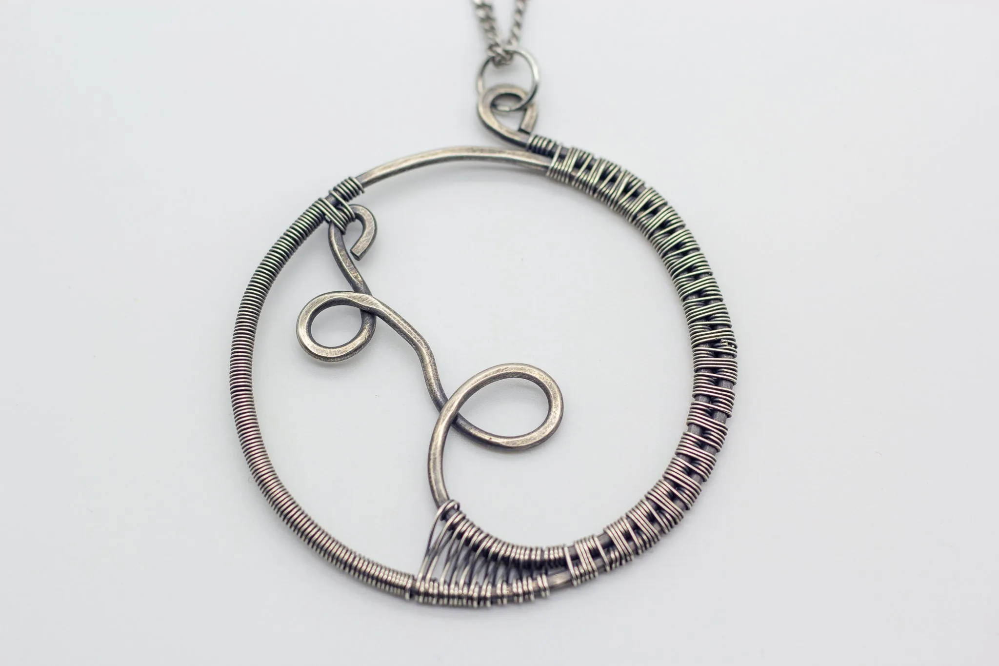 Circular Sterling Silver Wire Wrapped Pendant