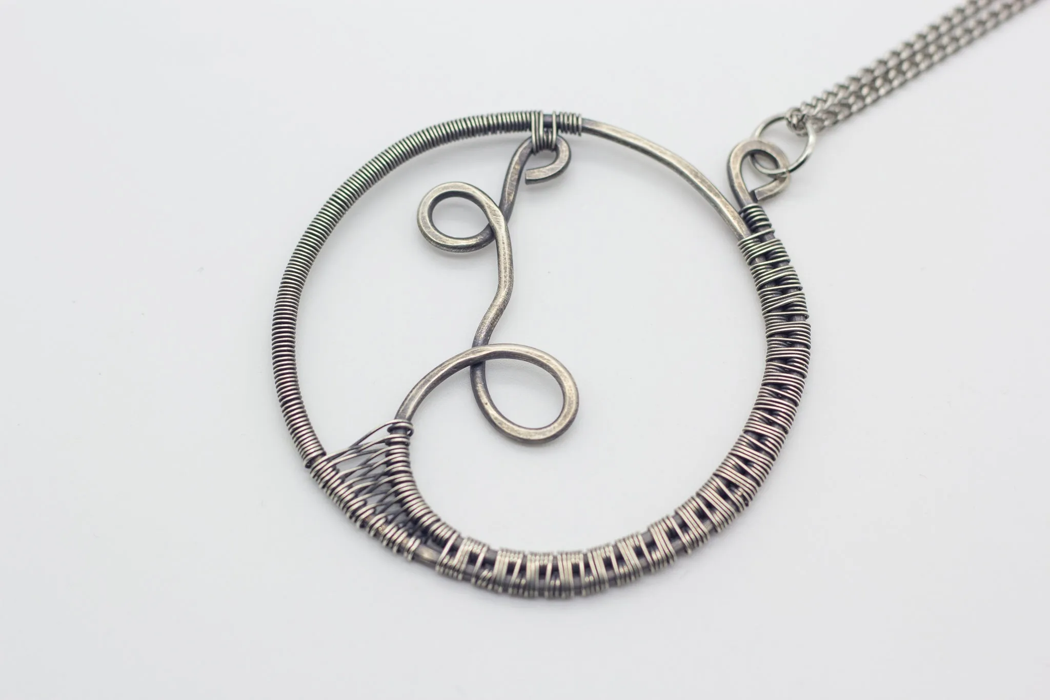 Circular Sterling Silver Wire Wrapped Pendant