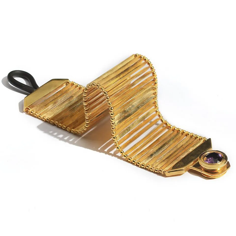 Flexi tach- design of gold bracelet for female