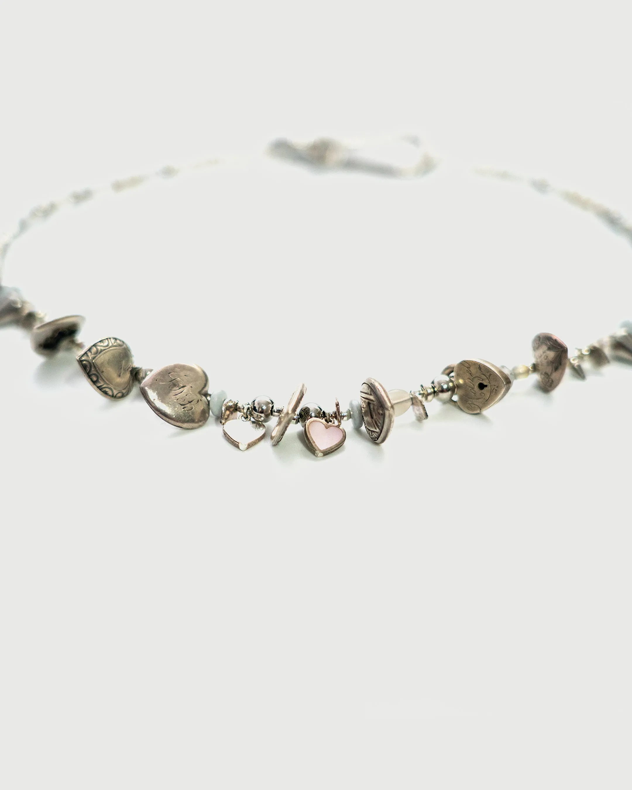 GREY WOLF HEART NECKLACE