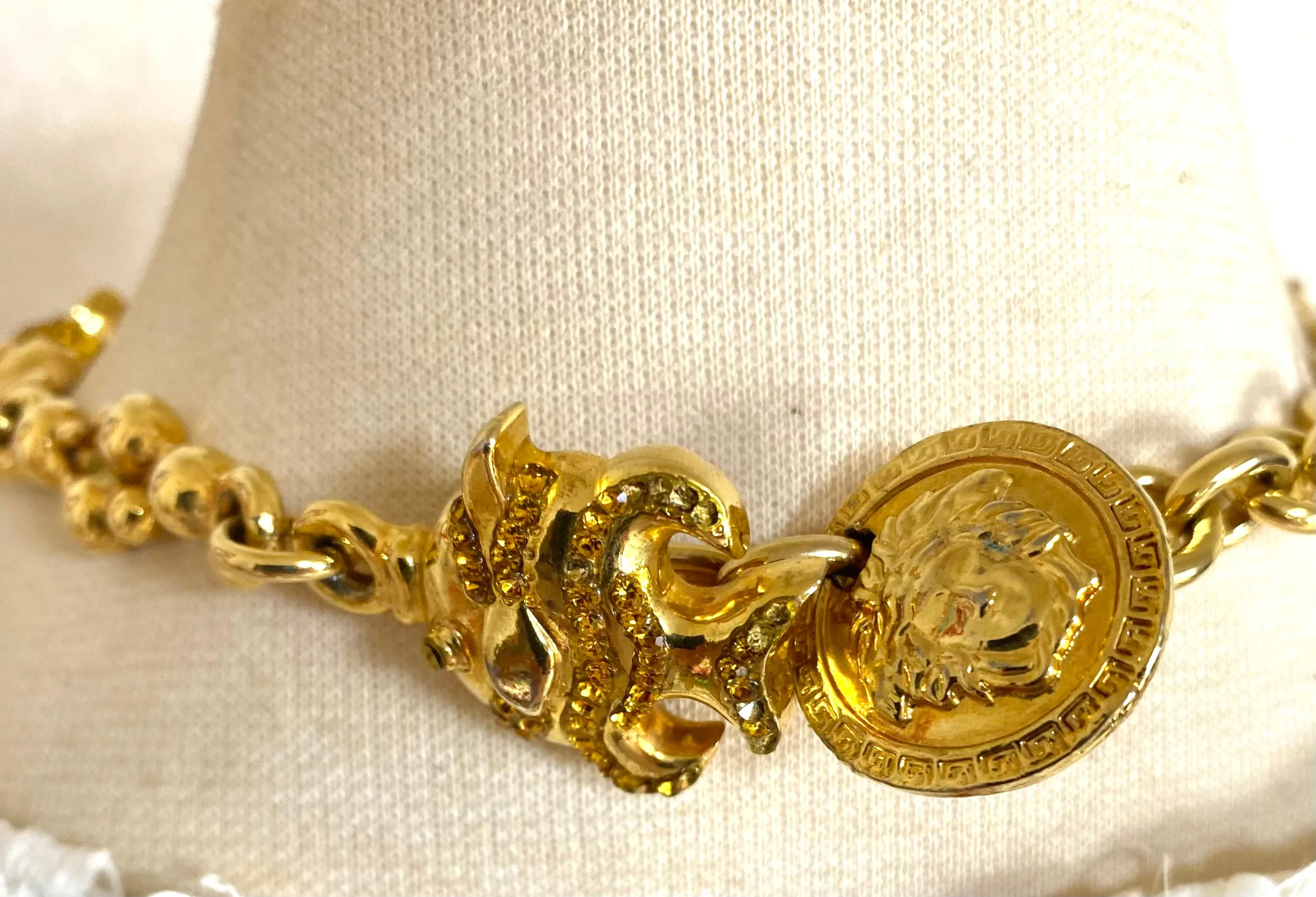 Vintage Gianni Versace golden chain necklace with fish and Medusa charms and yellow crystals. Can be a belt as well. 050719ya1