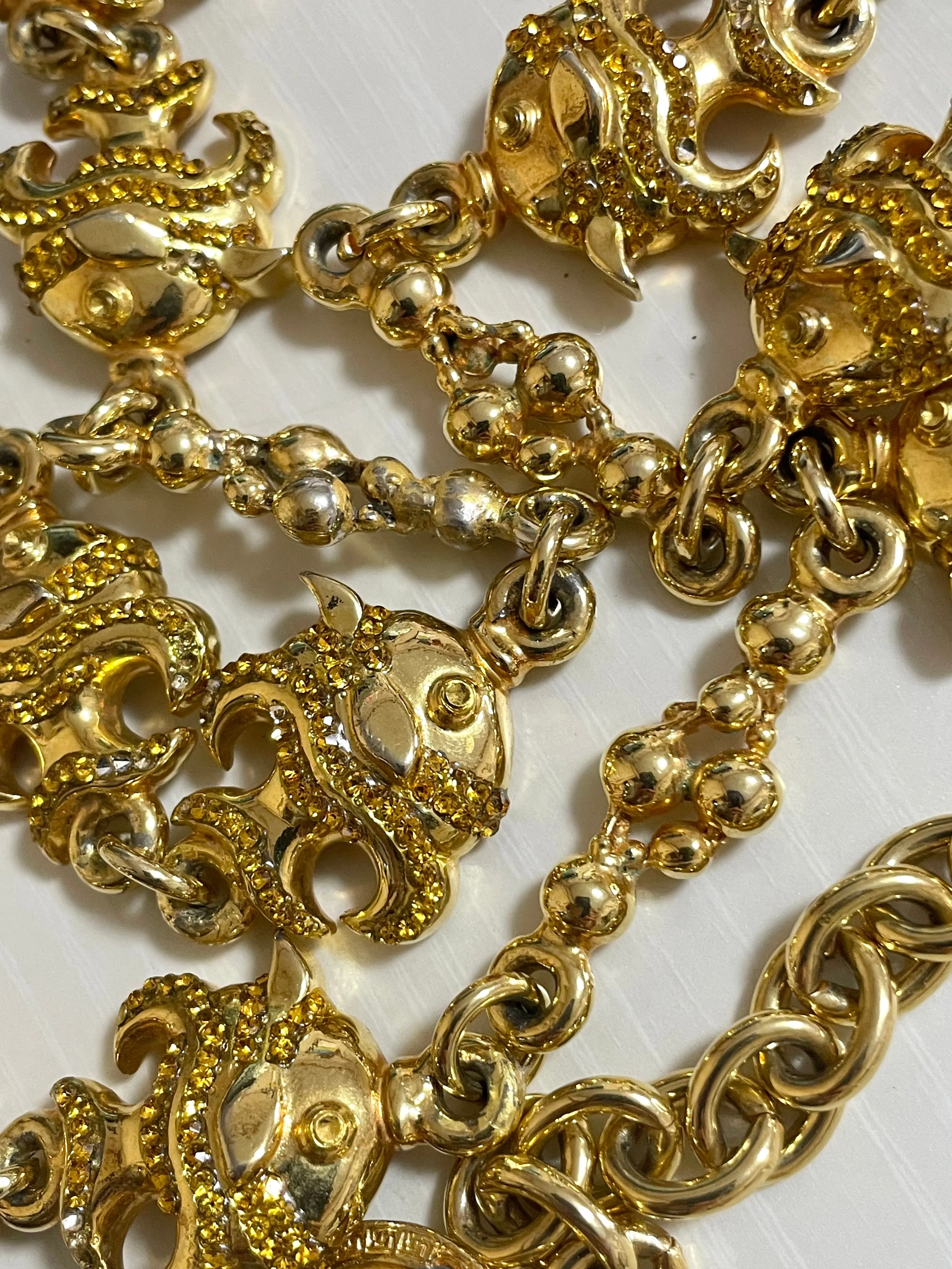 Vintage Gianni Versace golden chain necklace with fish and Medusa charms and yellow crystals. Can be a belt as well. 050719ya1